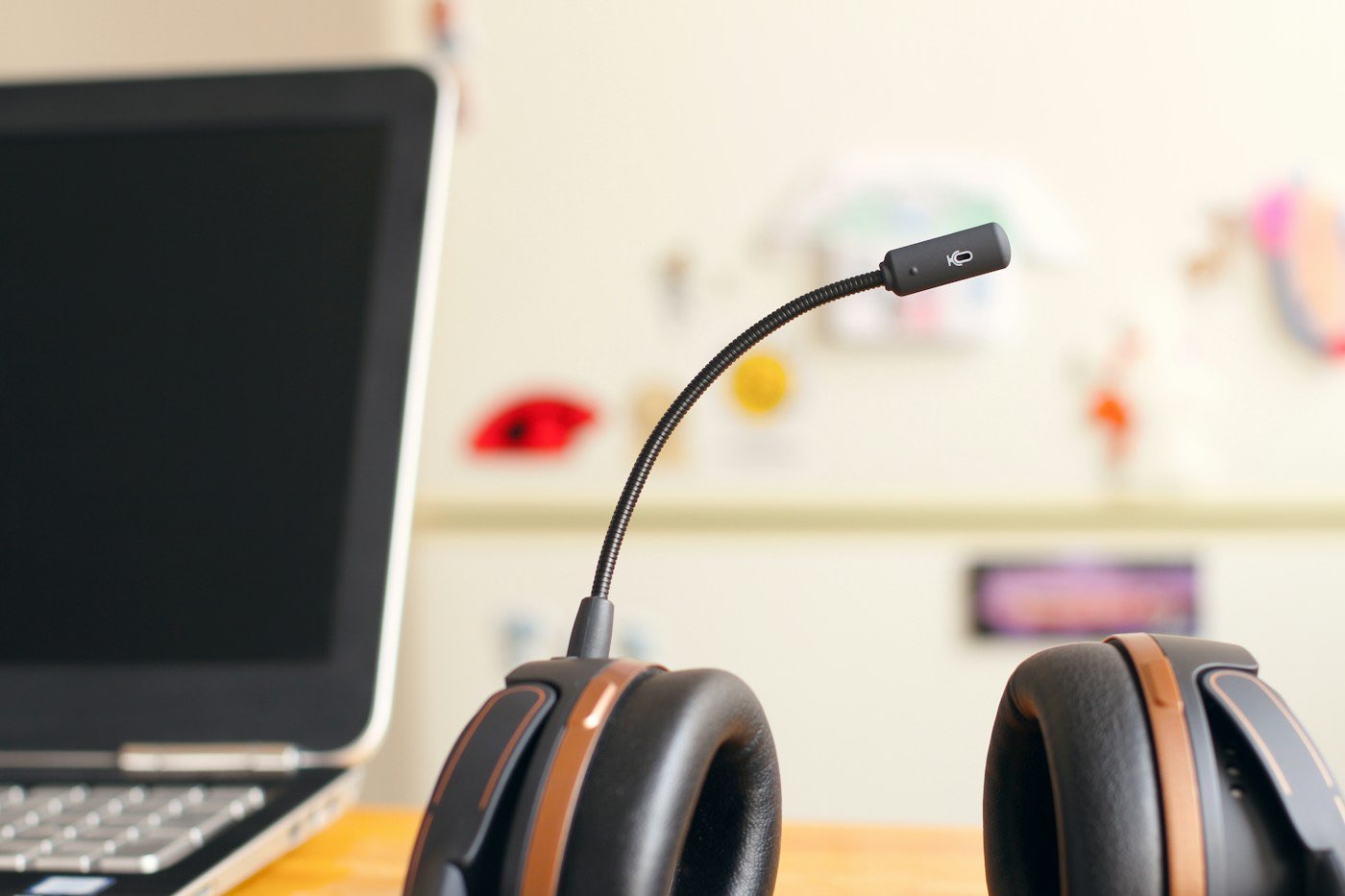 Headset beside a laptop